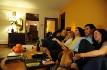 image of family watching TV